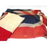 An early 20th century Union Jack flag, 4ft x 8.5ft, together with one large and two smaller French
