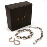 A Gucci silver oval link bracelet, boxed, a Links of London ropetwist bracelet and a pair of Links