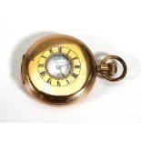 A gold plated half hunter pocket watch by Thomas Russell & Son, the white enamelled dial with