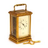 A modern St James of London carriage timepiece in a brass and five-glass case, h. 13 cm excl.