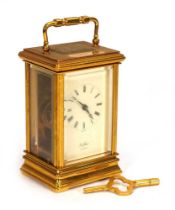 A modern St James of London carriage timepiece in a brass and five-glass case, h. 13 cm excl.