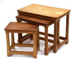 Robert 'Mouseman' Thompson of Kilburn, a nest of three oak occasional tables, each with the