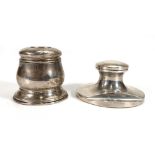 An Edwardian silver capstan-type inkwell, maker HCD, Birmingham 1909, d. 8.5 cm and a further