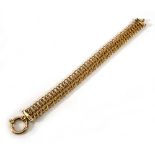 A 9ct yellow gold triple link bracelet with circular clasp, l. 19 cm, 12.9 gms