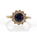 A 9ct yellow gold cluster ring set round cut sapphire and paste, ring size M 1/2, 2.4 gms