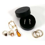 Two 9ct yellow gold dress rings set cameo and smoky quartz, a pair of 9ct ear hoops, overall 8.1