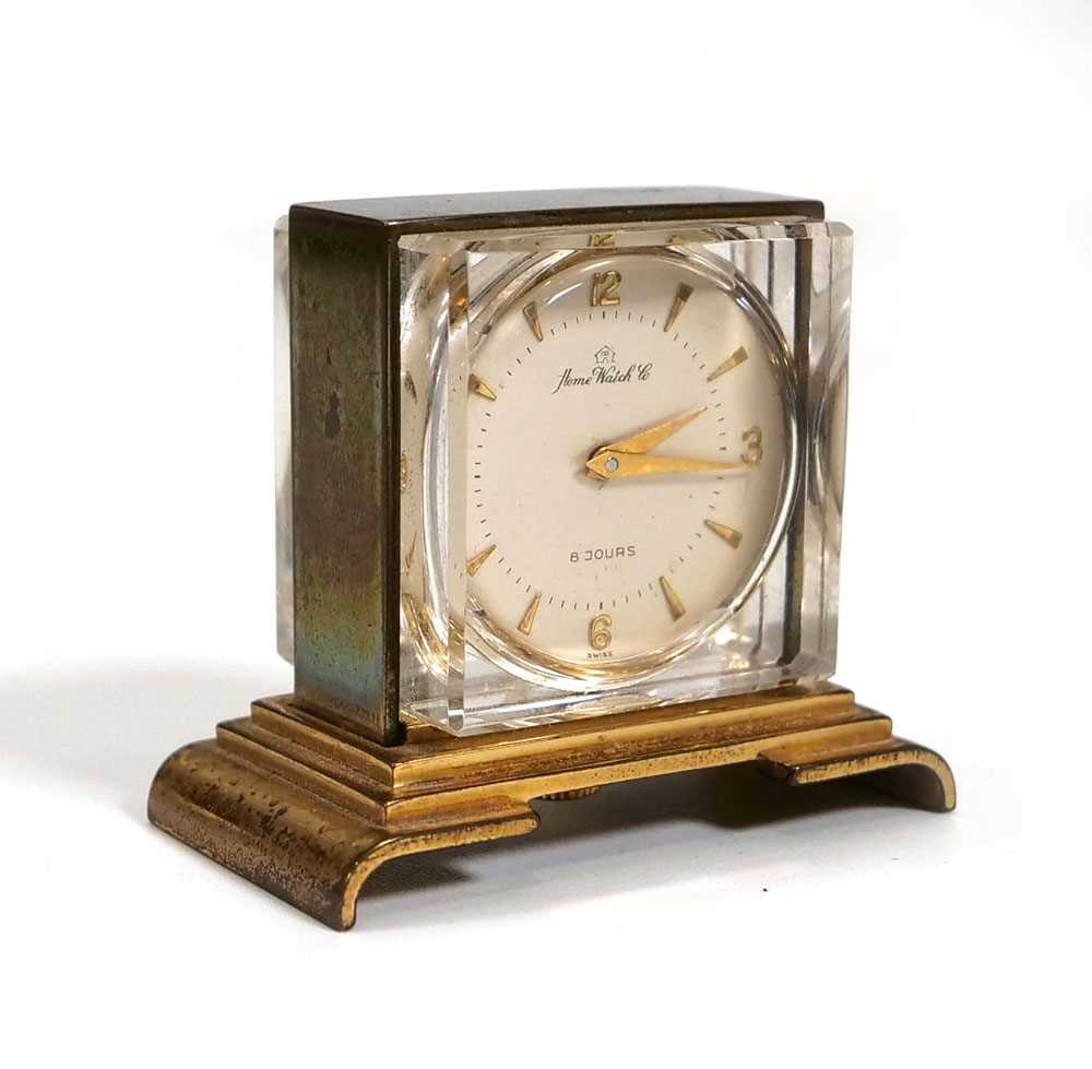 A miniature desk timepiece by Home Watch Co., the circular dial with gold coloured baton and