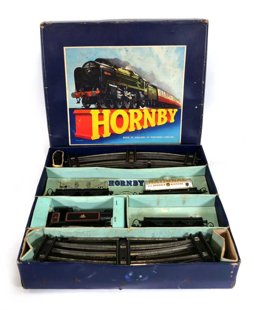 A Hornby O gauge tank goods train set, two 1st class coaches and a passenger brake van, all boxed (