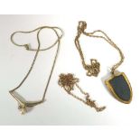 A 9ct yellow gold chainlink necklace, 2.7 gms, a gilt metal locket set hardstone and a silver gilt