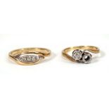 An 18ct yellow gold ring set small diamonds in a marquise shaped setting and an 18ct crossover