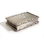 An early 19th century silver, engine turned and parcel gilt vinaigrette of rectangular form,