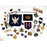 A group of collectables including patches, enamelled badges, cap badges, whistles etc.
