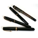 A group of four fountain pens with 14ct gold nibs by Conway Stewart, Onoto De La Rue, Swan and Monte
