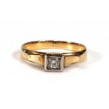A 14ct yellow gold and white metal highlighted ring set brilliant cut diamond in a square setting,
