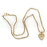 A 9ct yellow gold faceted chainlink necklace suspending a15ct yellow gold heart shaped pendant set