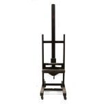 A Victorian adjustable studio easel by Newman's of Soho Square, bone label to the base, w. 60.5