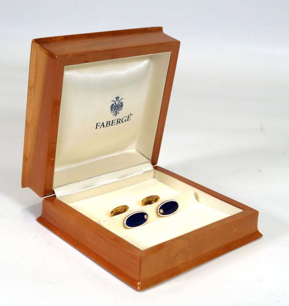 A pair of Faberge 18ct yellow gold cufflink's of oval form, each set a small diamond and decorated