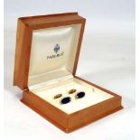 A pair of Faberge 18ct yellow gold cufflink's of oval form, each set a small diamond and decorated