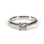 A platinum ring set brilliant cut diamond in a four claw setting,stone approx. 0.4 carats,ring