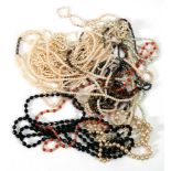 A small group of cultured and synthetic pearl necklaces, a jet-type bead necklace and other beaded