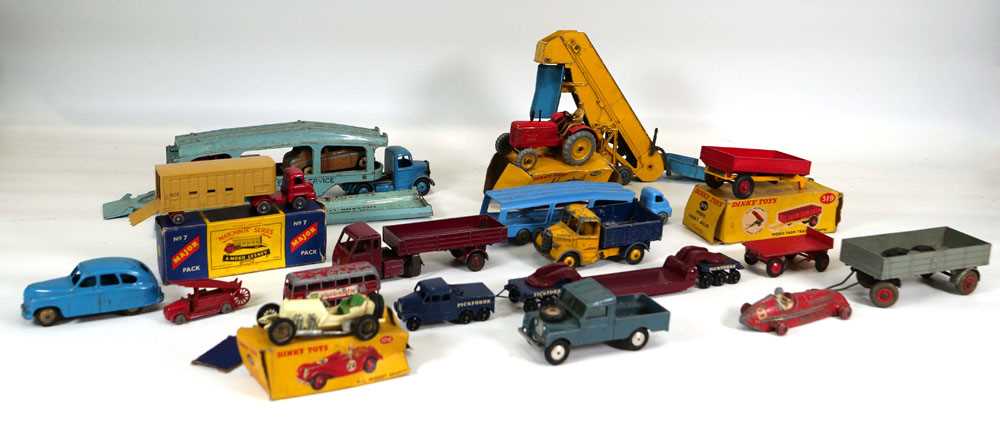 A group of Dinky, Matchbox and other diecast including farm vehicles, commercial models, a racing