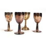 A set of three small silver goblets, maker BG, Birmingham 1970, h. 10 cm and a similar goblet,