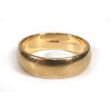 A 9ct yellow gold wedding band, Birmingham 2016, band w. 6 mm,ring size T,6.4 gms