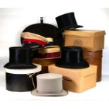 Theatrical Supplies: two tin hat boxes, two straw boaters, four boxed top hats etc.