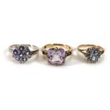 Three 9ct yellow gold dress rings set coloured stones, overall 7 gms (3)