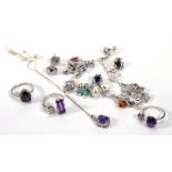 Two silver Sarah Bennett rings set amethyst, a Milano charm bracelet and a further ring, pendant