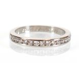 A Tiffany & Co. platinum half eternity ring set fifteen brilliant cut diamonds in tension settings,