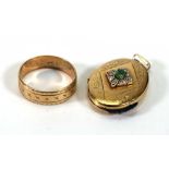 A 9ct yellow gold wedding band and a 9ct oval locket set emerald, overall 6.3 gms (2)
