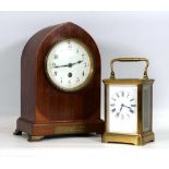 A 19th century carriage clock, bearing an inscription 'Col. Sergt A.White from H.R. B-H 1898', h. 14