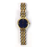A ladies stainless steel and gold plated De Ville wristwatch by Omega, the circular navy blue dial
