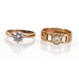 Two 9ct yellow gold rings set paste, ring sizes L and L 1/2, overall 5.2 gms (2)