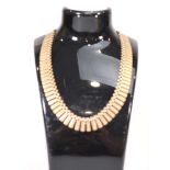 A 9ct yellow gold fringe necklace with textured rectangular links, l. 38 cm, 18.3 gms