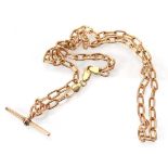 A 9ct yellow gold elongated link necklace with lobster clasp and t-bar, converted from a watch