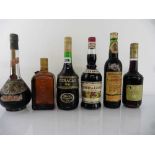 7 various old bottles, 1x Marie Brizard Curacao Orange Liqueur 68proof 24 fl oz, 1x Cusenier Creme