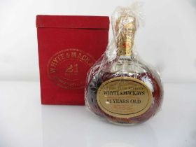 An old bottle of Whyte & Mackays 21 year old Blended Scotch Whisky with box circa mid 1970s 70 proof