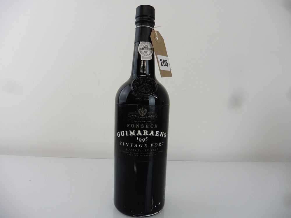 A bottle of Fonseca Guimaraens 1995 Vintage Port bottled in 1997 (Ullage into neck/high fill)