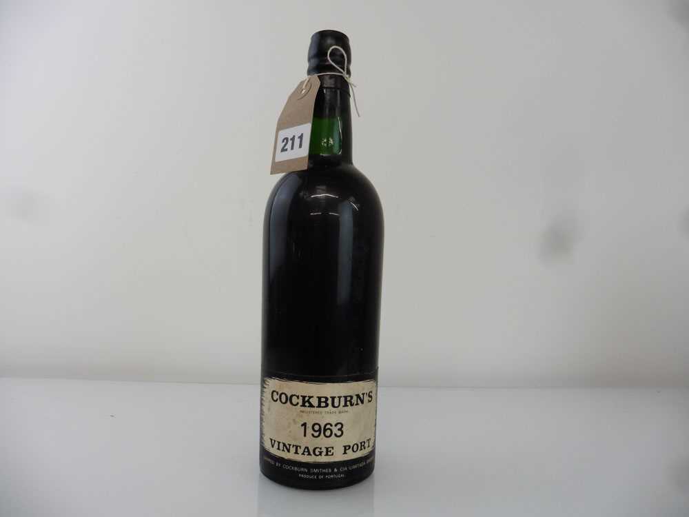 A bottle of Cockburn's 1963 Vintage Port (ullage top shoulder)