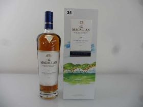 A bottle of The MACALLAN "Home Collection" The Distillery Highland Single Malt Scotch Whisky with