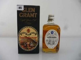 An old bottle of Glen Grant Distillery 8 years old Highland Malt Scotch Whisky with box circa 1970's