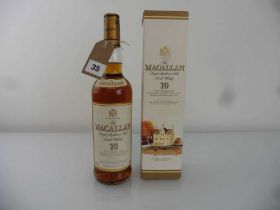An old bottle of The MACALLAN 10 year old Single Highland Malt Scotch Whisky matured in Sherry Oak