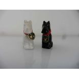 A Pair of Thistle Scotch Whisky Decanters in the form of Black & White Scotty Dogs No size stated