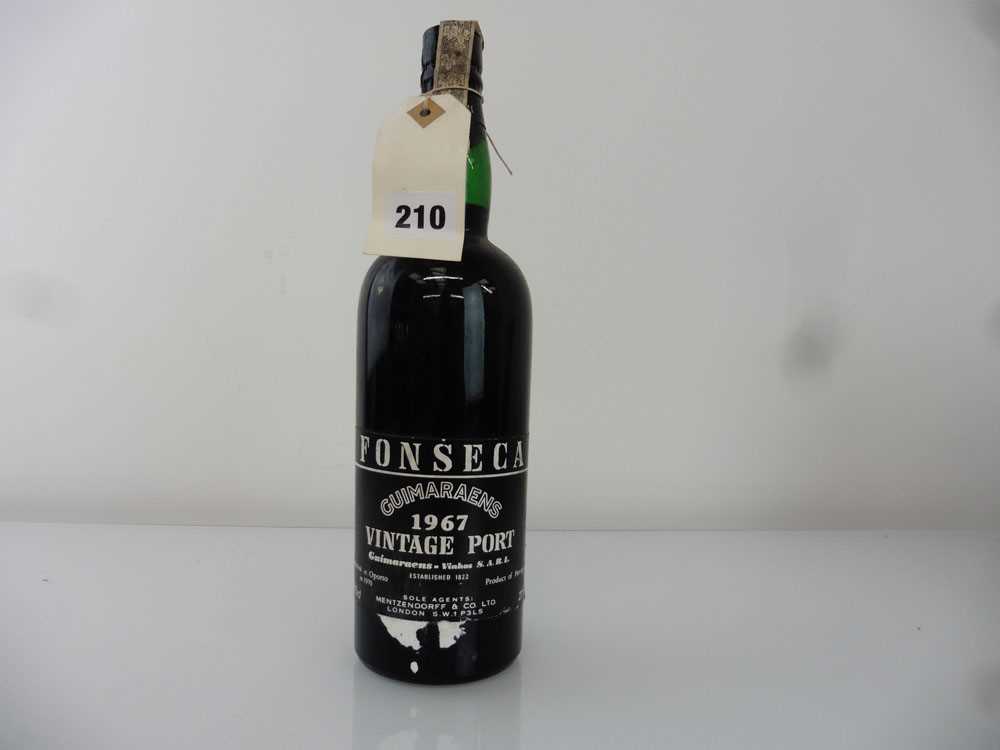 A bottle of Fonseca Guimaraens 1967 Vintage Port (ullage into neck)