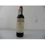 A bottle of Chateau Mouton Rothschild 1958 Pauillac, First Growth, Premier Grand Cru Classe in 1973.