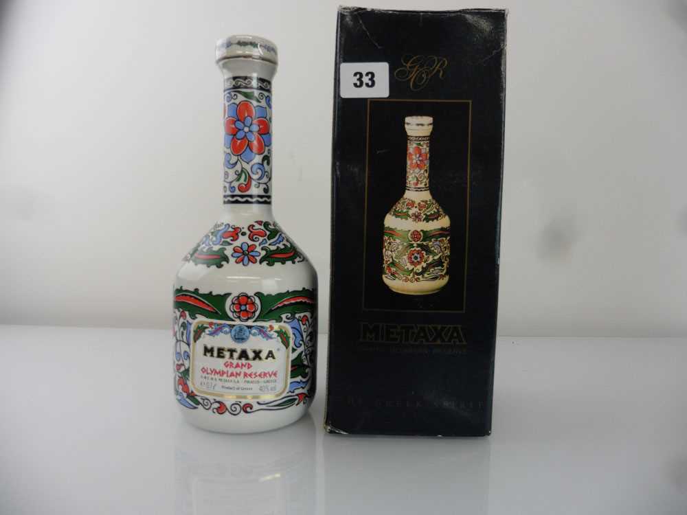 A ceramic bottle of Metaxxa Grand Olympian Reserve Greek Brandy with box circa 1990's 40% 70cl