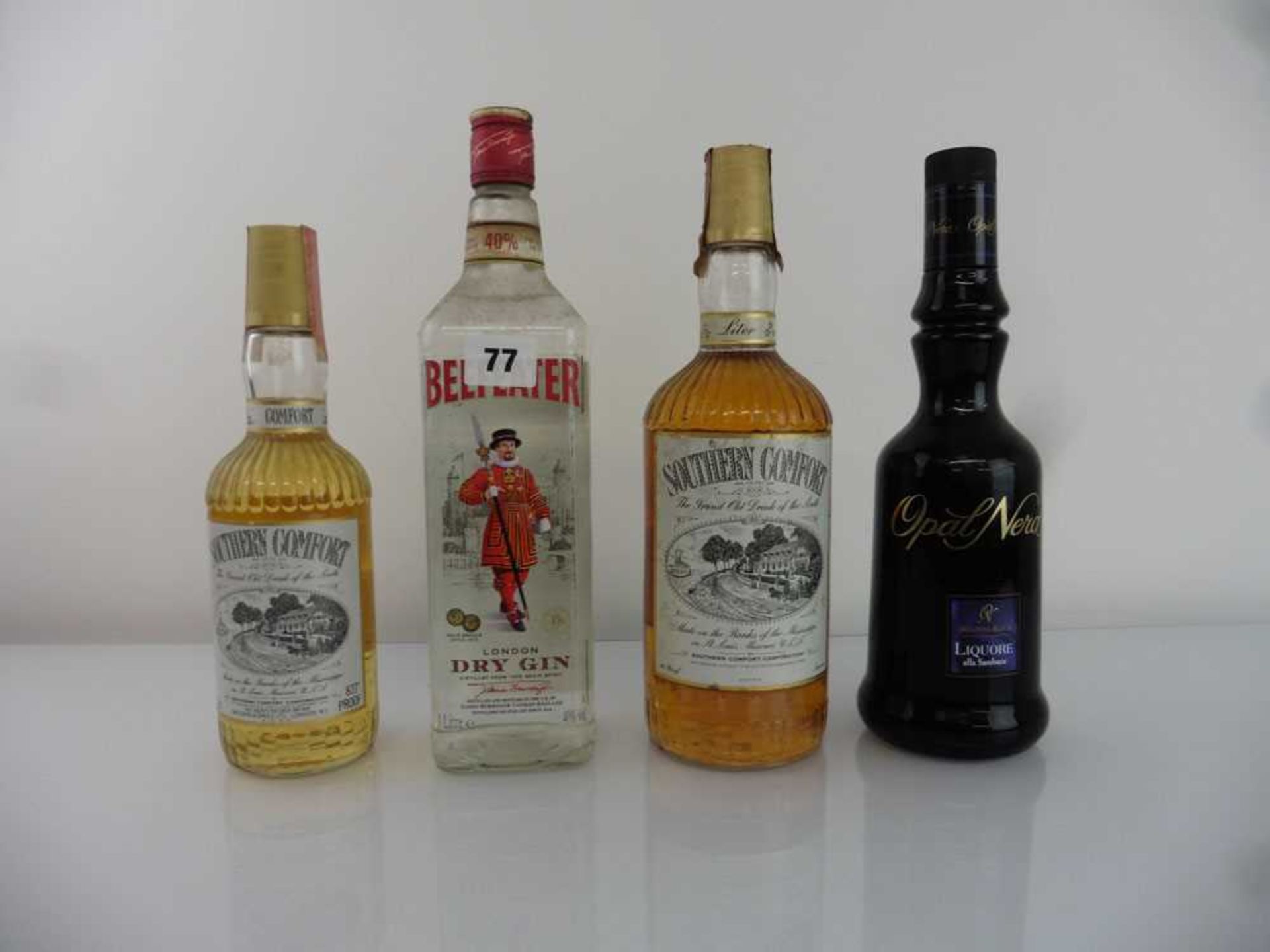 4 bottles, 1x Beefeater London Dry Gin 40% 1 litre, 2x Southern Comfort 86proof 1 litre / 87.