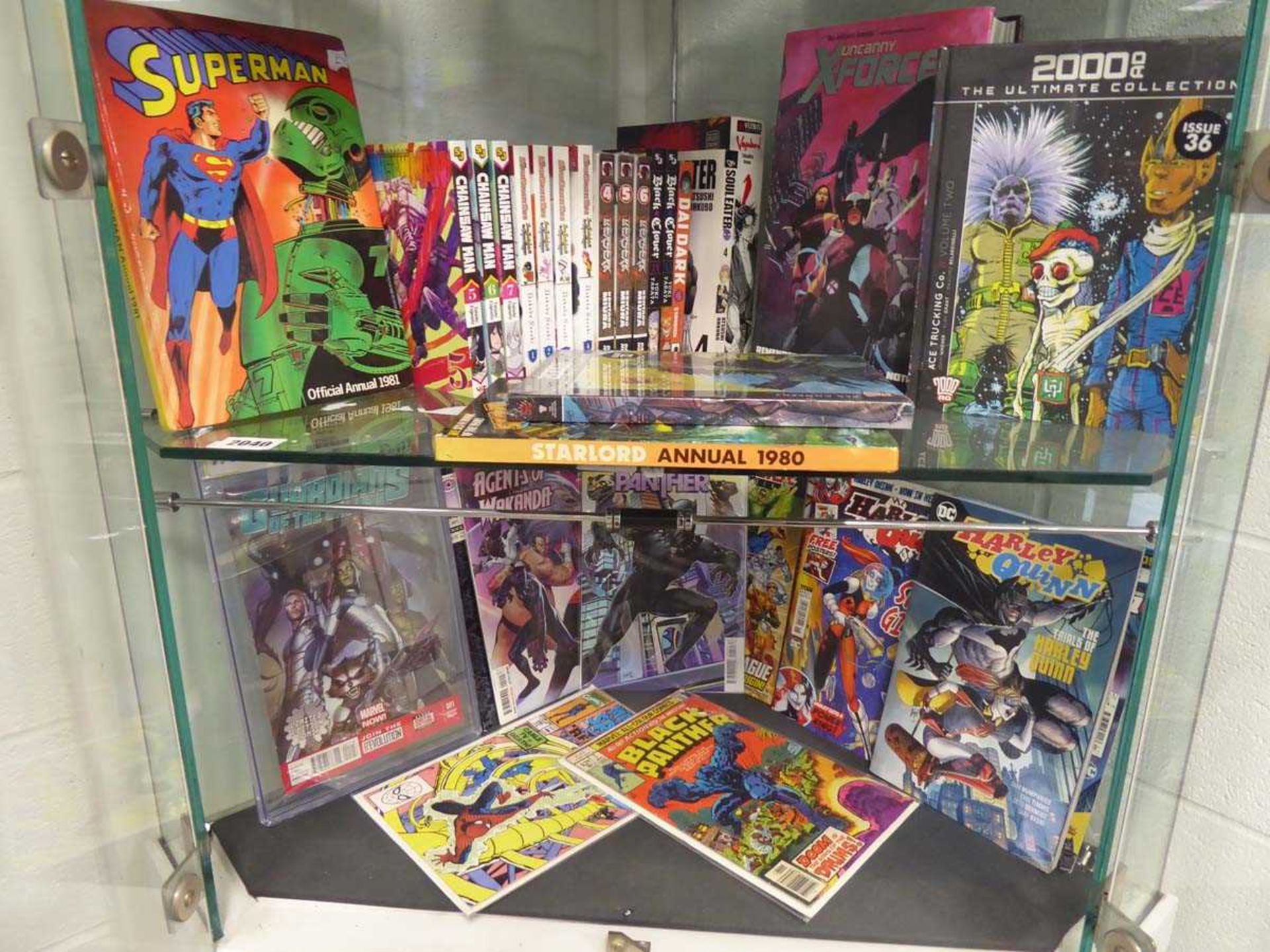 2 shelves containing selection of Marvel, DC, and other comic books inc. Black Panther No.7 Jan